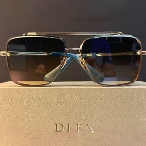 DITA Mach Six sunglasses light blue with gold new in box.